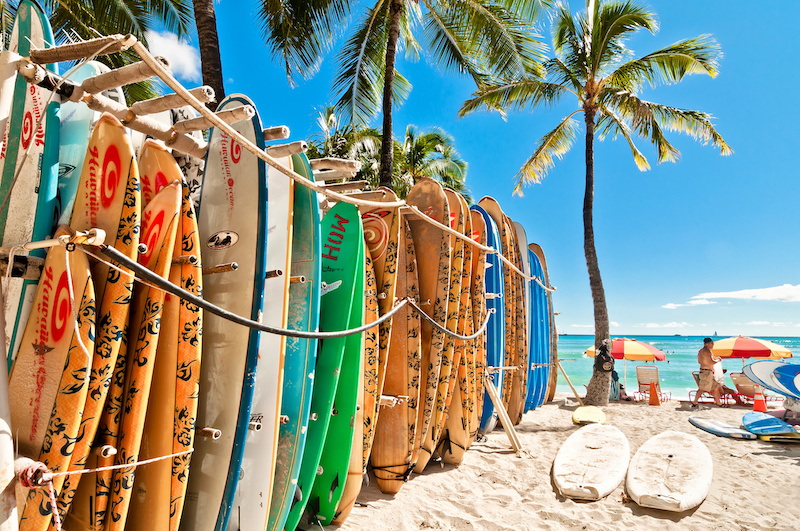 Surfboards lined up on Waikiki Beach