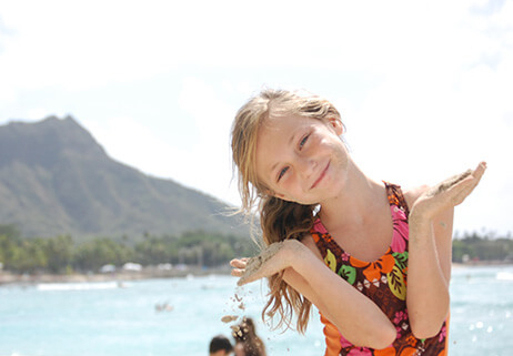 Girl smiling on Waikiki Beach